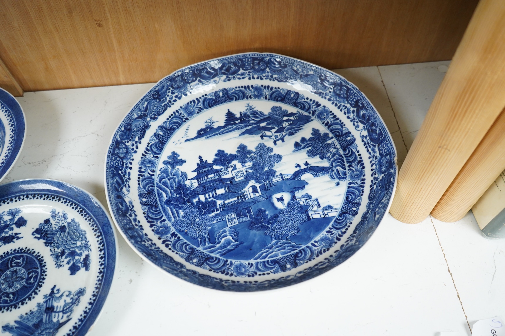 Five 18th / 19th century Chinese export blue and white plates and dishes, largest 27cm in diameter